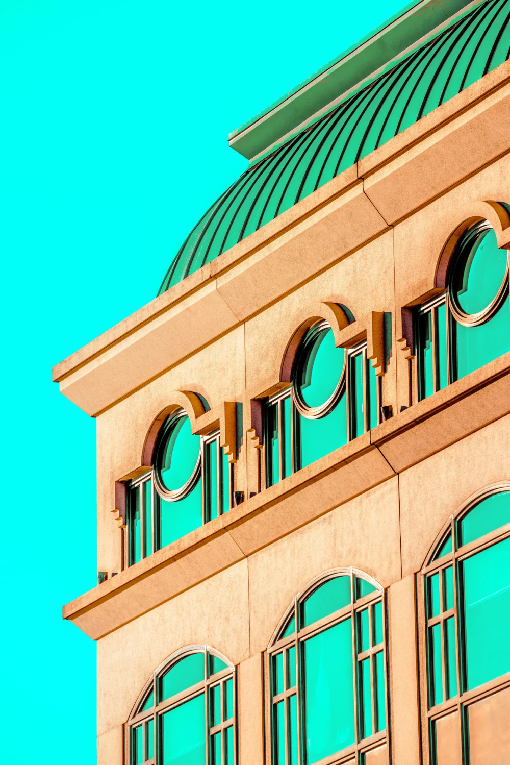 tan and blue green building