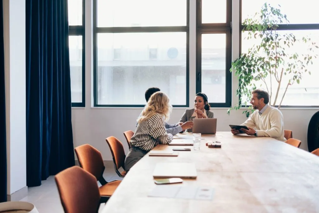 Leadership team meeting around a table