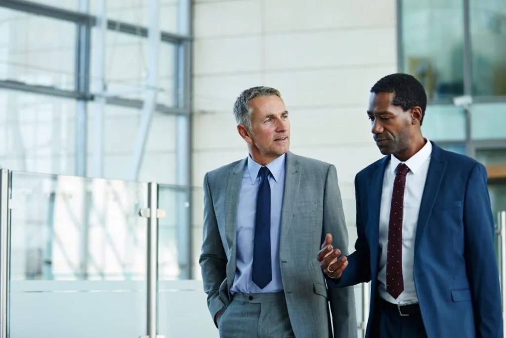 Two executives in conversation